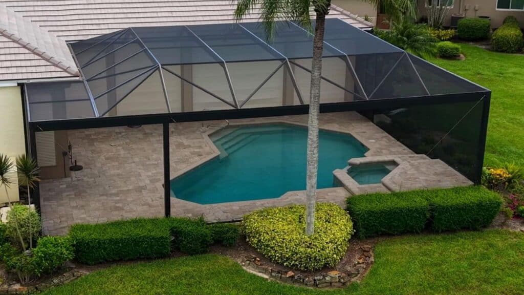 Pool cage enclosure with picture windows on all sides in The Vineyards Naples
