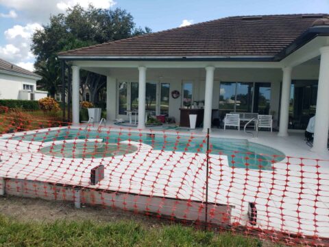Pool patio before aluminum screen enclosure installation in The Vineyards Naples Florida