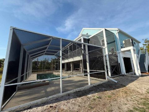 Aluminum pool cage enclosure at coastal home Sanibel Island Florida