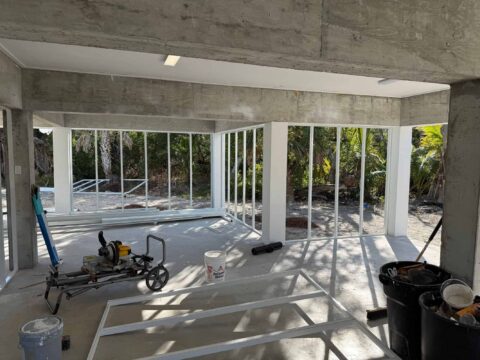 Screen wall framing beneath elevated home Sanibel Island Florida
