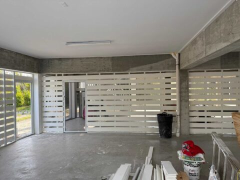 Aluminum privacy wall panels under stilt home Sanibel Island Florida