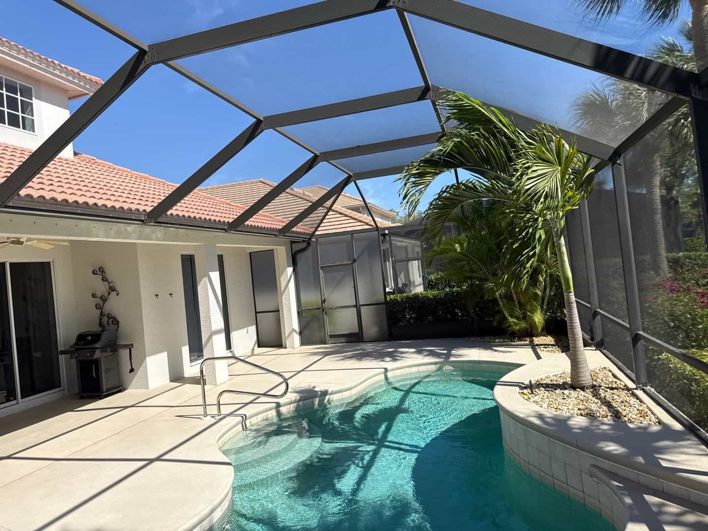 New dome pool enclosure at a Shadow Wood home in Bonita Springs